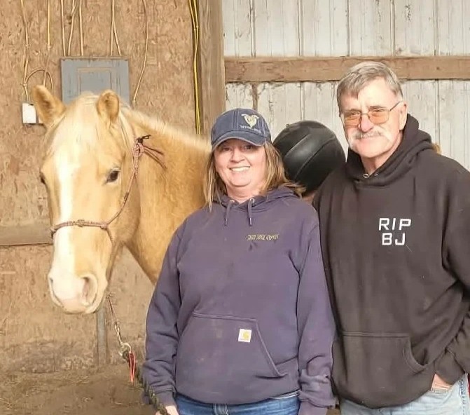 Uno with his owners